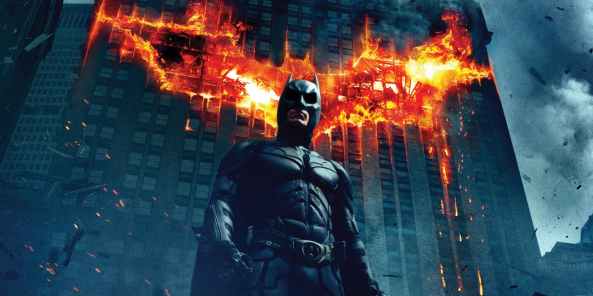 The-Dark-Knight-Standing-Before-a-Burning-Gotham